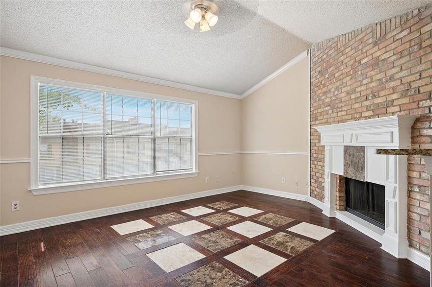 Welcome home to this charming upstairs one-bedroom condo, offered at $175,000. With soaring cathedral ceilings and a cozy brick fireplace, the living space feels bright, open, and welcoming from the moment you walk in. The kitchen features granite countertops, a stainless steel sink, microwave, electric range, disposal, and a never-used refrigerator. Even better, the washer and dryer are included—making move-in easy.

Perched upstairs, this condo has a wonderful nest-like feeling—peaceful, private, and comfortable. It’s the perfect place to relax at the end of the day, enjoy a quiet morning coffee, or simply feel at home in your own space. When you’re ready to get out, cool off and unwind at the community pool.

A great opportunity to own a place of your own at an approachable price—come see it before it’s gone! PERFECT FOR INVESTORS.