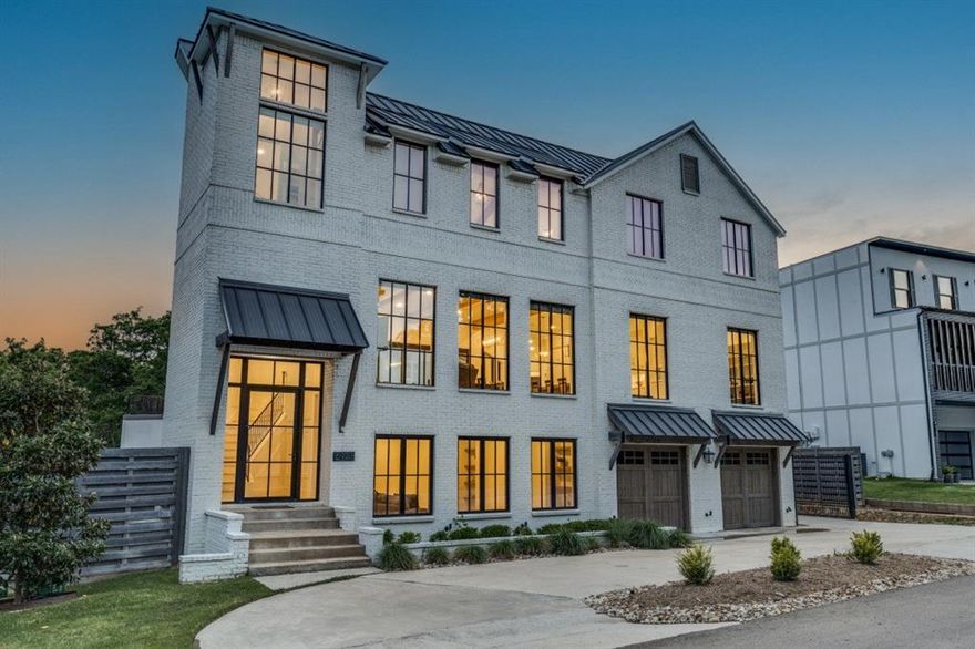 Wind down your day with beautiful views of the sunset over Grapevine Lake! This spectacular newer home in sought-after Flower Mound is just steps away from one of a few sandy beaches at Grapevine Lake and showcases treetop views of the lake from nearly every room. Outdoors, enjoy a resort-style deck replete with a stunning custom pool and spa, built-in grilling area, and fire pit — perfect for relaxing and entertaining friends and family alike. The gourmet kitchen is a chef's delight with stainless steel appliances, a 48” gas range, dual dishwashers, built-in refrigerator, hidden microwave, beverage refrigerator, ice maker, quartz counters and stone backsplash, custom cabinetry, and a handsome kitchen island. The serene primary suite offers a true spa-like retreat with lake views, a beamed vaulted ceiling, balcony, spacious walk-in closet with built-ins, and a bath with a glass-enclosed shower, luxurious marble tile, large soaking tub, and dual vanities. Elevator-ready, this home features three additional ensuite bedrooms, a grand fireplace in the main living room, and an accordion sliding-glass wall that adjoins the gourmet kitchen, dining area, and deck area with the elevated pool and spa. Additional amenities include a game-media room, study, two powder baths, three car-garage, a mudroom, two full-size laundry rooms, and an outdoor staircase from the deck to the lawn. With access to the highly acclaimed schools in Lewisville ISD, this exceptional home at 6903 Red Bud Dr provides a dream setting for indoor-outdoor living, all within a footpath walk to Grapevine Lake and a 20-minute drive to DFW Airport.