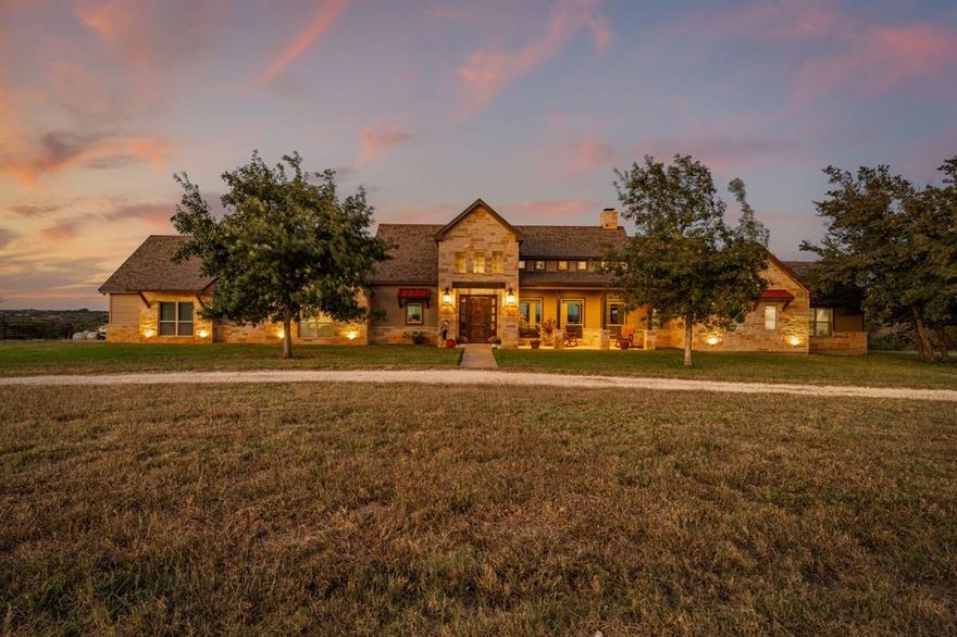 Discover this 211-acre property just minutes from Hico, Texas, where rustic charm and modern comfort converge. Located only 20 minutes from Stephenville’s amenities, this custom 2018-built estate offers a refined 4-bedroom, 3-bath home on a scenic rolling hill. The spacious 3,300 sq. ft. interior includes an open living area, gourmet kitchen, and dining space with a cozy wood-burning fireplace, ideal for gatherings. Additional conveniences include a safe room and storm generator.
Perfectly set up for cattle ranching and hunting, the property features three cross-fenced pastures: a 7-acre pasture with coastal grasses and a 33-acre Tifton pasture yielding over 100 hay bales per cutting. Water sources are strategically located for livestock, wildlife, and fishing, with new cattle working pens, a seasonal tank, and a large fishing tank. Managed for optimal grazing and habitat, the land is prime for deer, turkey, and dove hunting, with blinds and feeders across the property. An additional 20 acres borders Duffau Creek, offering more hunting opportunities.
Improvements include a 30' x 41' metal shop, a 14' x 14' fenced horse paddock with two stalls, a round pen, and cattle guards. A 1,000 sq. ft. guest cabin with a loft provides extra accommodations or a potential Airbnb. The ranch is serviced by three water wells, benefiting from agricultural and wildlife exemptions. Unique features like honeybee hives add to this property’s charm.
Ideal as a family retreat, working ranch, or hunting haven, this exceptional property is move-in ready!