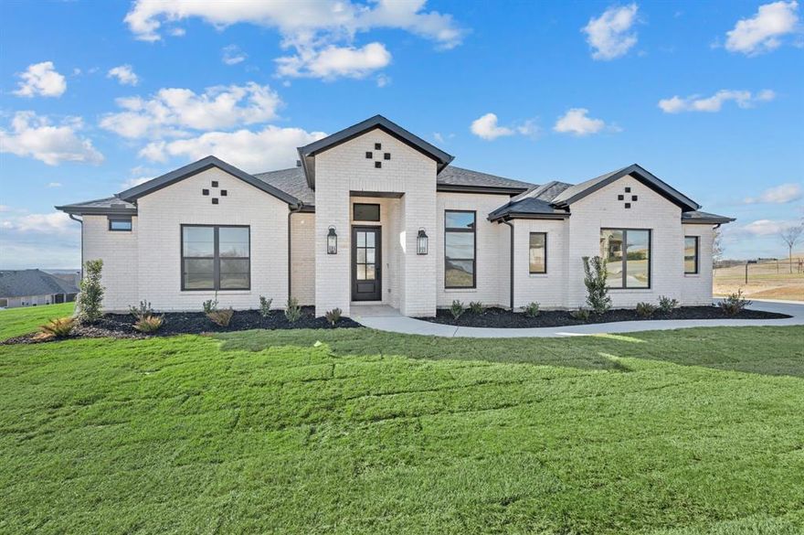 This is a great family home with 4 bedrooms,3 full baths, study, 2 car garage. Wide open floor plan with great room, dining and kitchen that overlooks the massive back yard and large covered patio area. Real hardwood floors throughout living, kitchen and dining area. Great brand-new floor plan that is getting rave reviews. The community Rocky Top Ranch is a new community in Reno, Texas offering luxury and peaceful serenity. Enjoy a small-town atmosphere and wide-open space. Rocky Top offers large 1+ acre lots. This scenic community features beautiful hilltop views and stunning sunsets. With convenient access to Eagle Mountain Lake, Springtown, Azle, Lake Worth, and Boyd, you’ll experience Reno’s rural charm while having city amenities nearby.