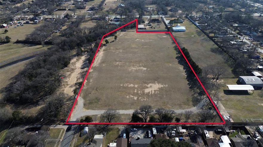 Versatile 8.9 acres within Seagoville city limits in Dallas County with potential for commercial or residential use (buyer to verify). Excellent opportunity for builders or investors seeking land close to the city with development flexibility. No known restrictions. Buyer and buyer’s agent to perform all due diligence.