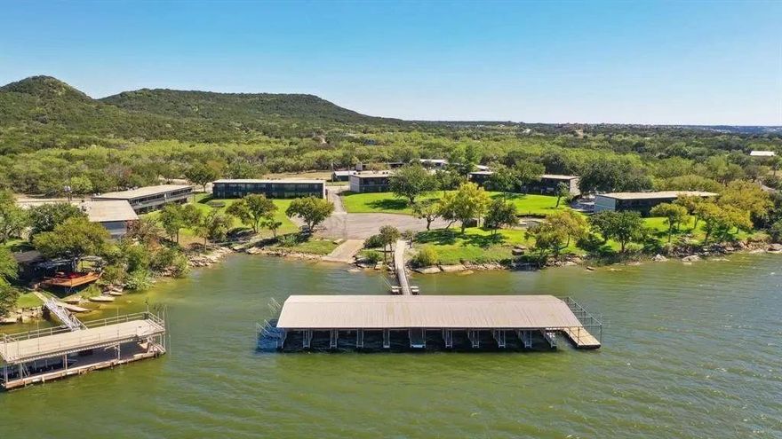Welcome to #A1, First-floor, 2-bedroom, 2 bath unit in The Hills Above Possum Kingdom—units like this are scarce, especially this time of year and won’t last long. This unit is on the end of the complex and has the Best View, Ideally located within the community, offering convenient access along with the peaceful setting and natural beauty that make Possum Kingdom Lake so desirable. Enjoy the lake right in your backyard, creating the perfect setting for relaxing, entertaining, or enjoying the outdoors. Ideal for a weekend getaway, full-time living, or investment opportunity.
Community amenities include a community pool, and boat ramp access.
Located just a short drive from DFW, offering the perfect balance of lake life and accessibility.
Unit #A1