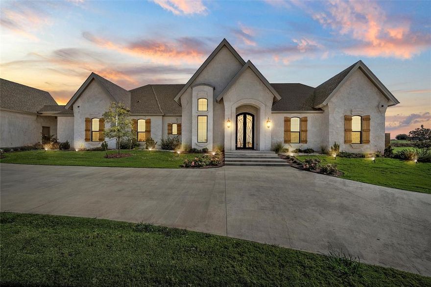 Let me introduce you to this modern french luxurious home built by Loera Home Builders!! This home is located in the prestigious subdivision of The Arches in Lorena Texas.
Providing a perfect blend of sophistication and comfort. Featuring four bedrooms, each with en-suite bathrooms, the house is designed for ultimate convenience. The open-concept living area boasts high ceilings, large windows, and fine finishes, creating an airy, welcoming atmosphere.
The modern gourmet kitchen includes top-of-the-line appliances and a large island, ideal for both cooking and entertaining. The master suite serves as a private retreat with a spa-like bathroom and her and his walking closet.
Outside, a beautifully landscape garden surrounds a sparkling pool and a cozy patio area, perfect for relaxation. A three-car garage and smart home technology complete this stunning residence, ensuring both luxury and practicality.