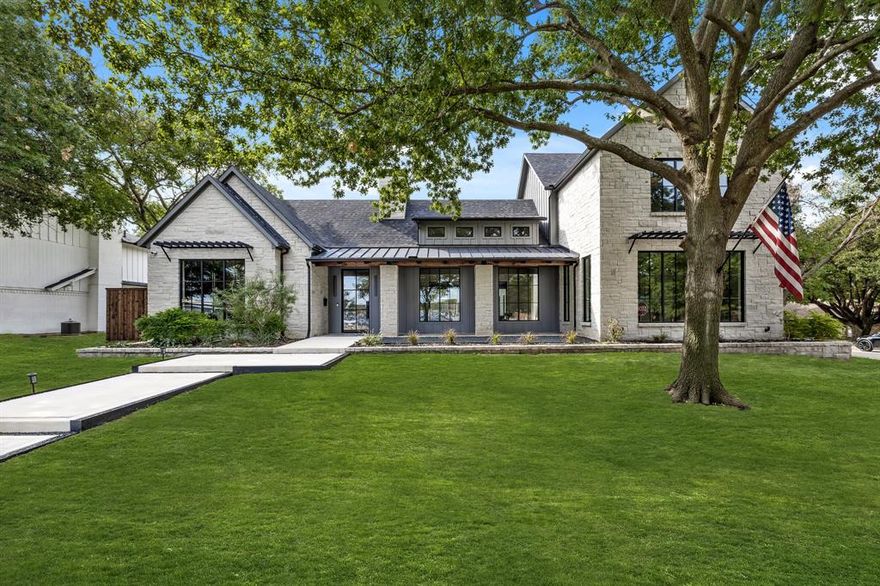 Discover the epitome of luxury living in this 5 bed, 6 bath masterpiece. The grandeur of this home unfolds with a magnificent open layout featuring vaulted ceilings. The high end kitchen is a culinary enthusiast's dream, spacious island, Dual Butler pantries and a wet bar for effortless entertaining. Experience indoor outdoor living as a 16ft wide Sliding Door leads you to an oversized patio equipped with overhead heaters and retractable screens, perfect space for year round enjoyment. First floor master is a private sanctuary, Showcasing a luxurious bath with an oversized vanity. Additional bedrooms, one on the first floor and three upstairs, each offer private baths. With its thoughtful design and masterful craftsmanship, this home exemplifies modern elegance for those seeking the finest in Dallas living.  Situated in this exclusive Dallas neighborhood close to many private schools. For Video Tour Search Youtube: Discover Luxury Living at 4406 Ridgeside Drive, Dallas, Texas 75244