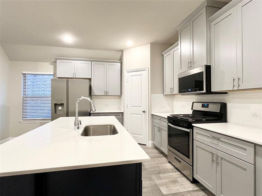 Bright, captivating and inviting, this home is accentuated by modern faux hardwood ceramic tile throughout the kitchen, family room and hallways easy to maintain. Spacious open kitchen features beautiful quartz countertops, gorgeous and functional island, ample cabinet space and gas cooktop. Set the table for happy times in the formal dining room. All of the bedrooms are generously sized with brand new ceiling fans installed. Secluded master suite overlooks a huge back yard and features a walk-in closet, spa like master bath featuring dual sinks, quartz vanity, separate shower and garden tub. Split bedrooms, other three spacious bedrooms set apart allows for privacy. Two-inch blinds in all windows. Tankless water heater and in ground sprinkler system. Covered back patio perfect to relax and unwind in huge back yard. Look forward to coming home to make memories in this newer home! LOCATED IN A PRIME AREA with community pool, great neighborhood, Rated A Award Winning Prosper Schools!!! Easy access to major transportation veins, Hwy 75 & Hwy 380, close to hospital, convenient to Allen Outlet Mall, shopping and restaurants! Make this your sweet home.