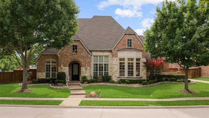 This stunning Huntington home boasts timeless curb appeal with an elegant brick and stone elevation, perfectly positioned on a beautifully landscaped corner lot with a private backyard oasis. Inside, a grand entry welcomes you with rich hardwood flooring that flows throughout the main living spaces, setting the tone for the home’s sophisticated design.  Thoughtfully crafted for both upscale entertaining and everyday comfort, the home features formal living and dining rooms, along with a private executive study complete with custom wood built-ins and coffered ceilings. The gourmet kitchen is a true showpiece, offering a built-in Sub-Zero refrigerator, commercial-grade 6-burner WOLF gas range, oversized island, and seamless flow into the spacious family room anchored by a warm fireplace.  Privately tucked away, the luxurious primary suite offers room for a sitting area and tranquil views of the backyard retreat. The spa-inspired bath features dual vanities, a soaking tub, separate walk-in shower, and an expansive custom closet with built-in dresser. A secluded guest or mother-in-law suite with full bath is ideally located at the front of the home.  Upstairs, you’ll find three generously sized secondary bedrooms, a versatile flex space, media room, and an entertainer’s wet bar complete with beverage fridge. A private balcony provides the perfect additional retreat to relax and unwind.  Outdoor living is equally exceptional with a covered patio, built-in grill, sparkling pool and spa, and ample grassy space for play or pets.  Located within the highly acclaimed Frisco ISD and the coveted master-planned community of Stonebridge Ranch, residents enjoy premier amenities and convenient access to major highways, shopping, dining, and entertainment.