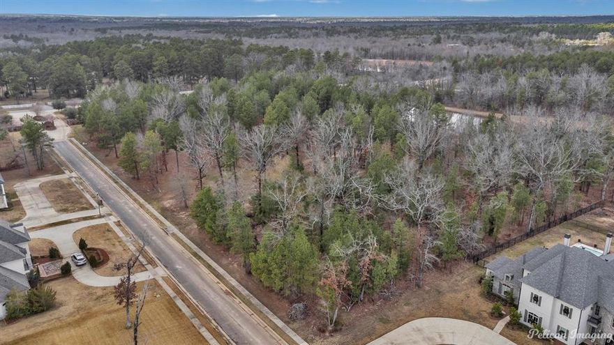 Build your custom dream home on this Beautiful residential 2.2 acre lot in St. Andrews gated subdivision!!  One of South Shreveport's premier gated neighborhoods located conveniently
to 1-49, new restaurants and shopping!!  This neighborhood is quiet and tranquil 
with wooded lots and a stocked pond.  Located on Wallace Lake Road - off the Southern Loop.