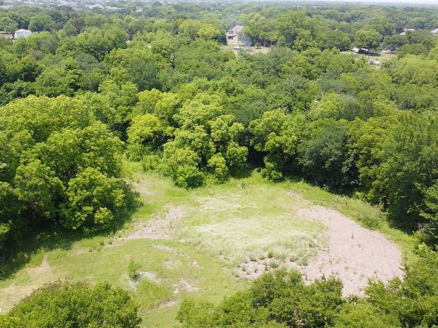 Endless Opportunities Await on This Stunning 5.7-Acre Wooded Lot!

This prime property is ideally located with all utilities available, featuring a small house, a shed, and a pond, all conveniently situated right off Dalrock Road.
 5.7-acre lot and It’s close to everything Rowlett has to offer, including great schools access and the George Bush Turnpike.
The lot can be subdivided and is preliminarily approved for 7 individual home sites by the City of Rowlett. Comprehensive site plans, topographical maps, geo reports, and more will be available with the purchase.
Or if you are looking to build your own Mansion or Farm, that would be perfect too!