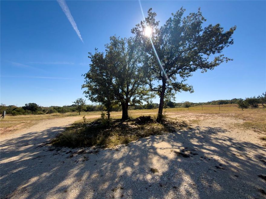 Here is the perfect canvas for your dream home on this beautiful 5-acre improved tract offering the ideal blend of convenience and country charm. The property is ready to build, complete with electricity connected, a brand-new water well, and septic system. Dual road frontage on County Road 209 and FM 1824, providing easy access and flexibility for your homesite layout. The land is completely fenced, features a gravel driveway, and already has 30-amp and 50-amp plug-ins for your RV or temporary setup while you build. Plenty of room for your animals, barns, or workshop. Located within an excellent driving distance from Stephenville and Tarleton State University, this property offers peaceful country living with city conveniences close by. Bring your plans, your kids and your animals and let's make this your Texas country estate!