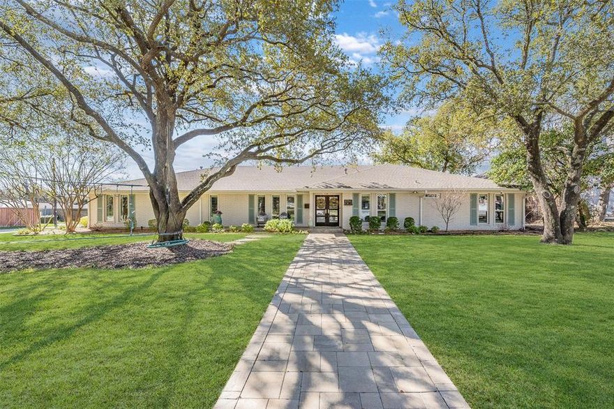 Refined living in one of Dallas’ most coveted enclaves, this exquisitely updated residence blends timeless elegance with modern sophistication. Designed for both grand entertaining and intimate everyday living, the open-concept floorplan is anchored by a stunning stone fireplace creating a warm yet elevated focal point.  This thoughtfully designed home offers 4 spacious bedrooms, 3 beautifully appointed baths and a great office or hobby room.  New plantation shutters add classic architectural charm and understated luxury. The kitchen features custom cabinetry, stainless steel appliances including a gas cooktop, and rich granite countertops all seamlessly flowing into the main living and entertaining spaces.  The expansive primary suite is a sanctuary of comfort, complete with a wonderful pool view through elegant double doors and a generous walk-in closet. The spa-inspired primary bath offers a serene escape with a freestanding soaking tub, oversized marble-clad shower and marble countertop. This home has been meticulously improved throughout including updated ductwork, enhanced attic insulation for energy efficiency, an updated electrical panel and a sprinkler system. The gorgeous, new brick paver walkway and driveway adds timeless curb appeal. The private backyard oasis features an expansive patio and inviting pool perfect for both relaxed evenings and vibrant gatherings. Conveniently located near the Northaven Trail, offering easy access to scenic walking, running and biking paths. Surrounded by Dallas’ most prestigious private and public schools, this exceptional home offers not just a residence but a lifestyle defined by comfort, elegance, and convenience.