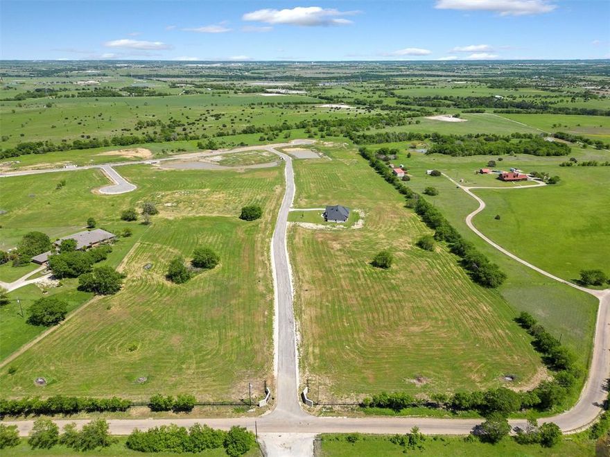 The lot has an existing water well valued at $30k.  Conveniently located between Godley and Cleburne with easy access to Chisholm Trail.  Architectural approval is required with a minimum of 2,400 sq. ft. for a one-story story and 1,800 sq. ft. minimum on the 1st level of a two-story build.  Stone or Masonry only and side entry garages are required.  No city taxes and served by United Services for electricity and internet.  Each lot will require the installation of a water well.  Pets are limited to 3 domesticated pets with a maximum of two dogs.  The description and pictures are not lot specific.  Applies to the subdivision as a whole.  Development is subject to deed restrictions. Schools are to be verified by the buyer prior to closing.
Lot size source - Final approved plat