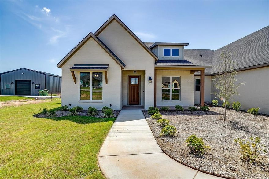 Welcome to 115 Esther Court in highly sought-after Brock ISD, where thoughtful design, everyday comfort, and peaceful privacy come together in a home that truly lives beautifully.
Inside, the open-concept layout invites you to relax and gather with ease. The private primary retreat is a standout, featuring a spa-like bath and oversized his-and-her closets that make everyday living feel effortless. Real hardwood floors flow throughout all first-floor bedrooms, adding warmth and timeless character. Two secondary bedrooms share a stylish bath, while a third enjoys its own private ensuite — perfect for guests or multigenerational living.
Upstairs (or tucked away for flexibility), the expansive bonus room is filled with natural light and offers endless possibilities as a game room, media space, or spacious 5th bedroom complete with its own bath and closet.
The chef’s kitchen is designed to impress, showcasing upgraded KitchenAid appliances, a gas cooktop, double ovens, and an oversized hidden walk-in butler’s pantry that keeps everything organized yet out of sight. Additional highlights include spray foam insulation for energy efficiency, a 3-car garage, and built-in mudroom lockers that make busy days run smoothly.
Set on a scenic 1-acre homesite, the backyard offers the freedom to create your dream outdoor oasis — whether that’s a pool, shop, or both.
Seller financing available — contact listing agent for details.