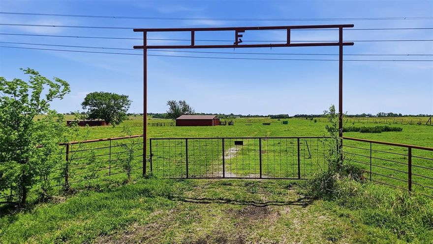 Exceptional 61-acre tract ideally positioned between Celina and Gunter offering prime grazing land with elevated topography and panoramic countryside views. This fully fenced property is well-suited for cattle operations, featuring lush native grasses, multiple ponds for reliable water sources, and gently rolling terrain. A prominent red barn serves as the centerpiece of the property, complemented by an additional shed providing ample storage for ranch operations. The land is thoughtfully laid out for livestock with wide-open pasture and easy accessibility throughout. The higher elevation provides excellent drainage and sweeping views, creating both functional and aesthetic appeal. Whether for an active cattle operation, investment hold, or future homesite, this property offers versatility in a rapidly growing corridor of North Texas. Convenient access to Celina, Gunter, and nearby major roadways makes this a rare opportunity to own a sizeable, improved tract in a highly desirable location.