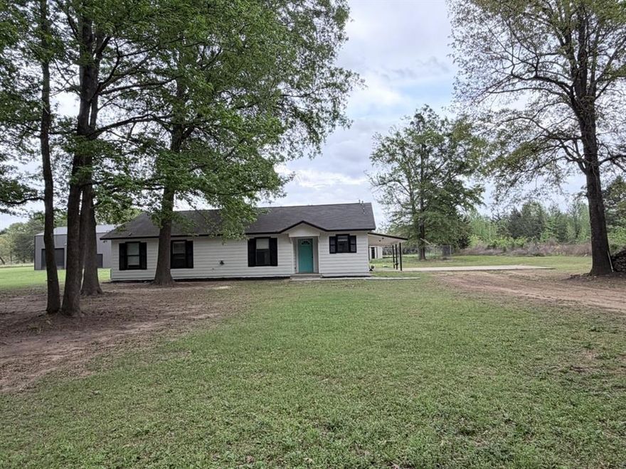 Huge Shop with Awning and Roll-Up doors- Complete Remodel - Country Living. This remodeled 3 bedroom, 2 bathroom home sits on its private 2 acre lot with a 1500 sq ft shop and large outdoor entertaining area. The kitchen has a pantry and laundry connected. This property offers abundant room for the family to roam and storage for weekend toys! Call today for a showing! More photos and drone photography coming soon with weather permitting.