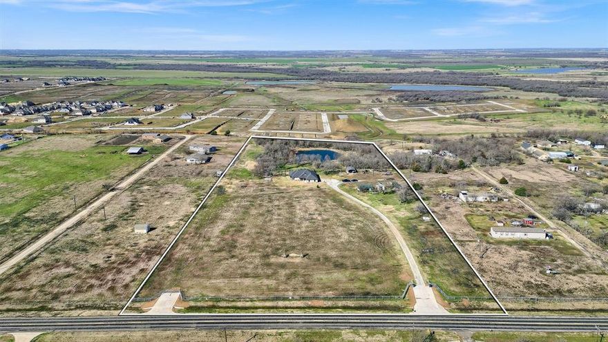Acreage with 428 ft of frontage on Future Legacy Rd. just west of Celina. This property has 10.5 ac that offers great investment opportunity along a prime commercial use area. This property includes custom-built traditional home, that can be used for residential or business purposes. Two access points gives an exceptional variety of uses. This area of Celina is in the ETJ but has no zoning at this time. This area is poised for significant future growth and profitability. Residential development to the south of west. This property is an excellent investment opportunity, especially considering its prime location along Future Legacy Rd. west of Celina. With 10.5 acres and 428 feet of frontage, it offers great visibility and accessibility, which is essential for both residential and commercial development. The custom-built traditional home adds flexibility for various uses, whether as a business or residential property. Key highlights include: Large Acreage: 10.5 acres with 428 feet of road frontage on a major thoroughfare, offering multiple access points. Prime Location: Situated in an area poised for future growth and development, especially with residential developments already underway nearby. Zoning Potential: The fact that the property is in Celina’s Extraterritorial Jurisdiction (ETJ) and has no zoning at this time means there is flexibility in how the property can be developed in the future. Investment Opportunity: With residential and commercial development likely to continue in the area, this property holds significant potential for appreciation in value and profitability. This property offers both short-term flexibility and long-term investment potential. Whether you’re interested in residential development, commercial use, or a combination of both, it’s an exciting prospect. If you’re looking into potential uses, zoning considerations down the road would be something to keep an eye on, given the growth and evolving plans for the area.