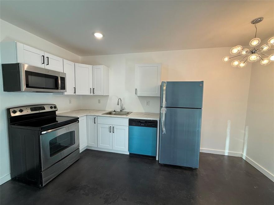 Welcome to this charming 2-bedroom, 1-bath accessory dwelling unit, thoughtfully converted from a detached garage into a cozy modern home. Step inside to find beautifully stained concrete flooring flowing throughout the space, offering both style and easy maintenance. The open-concept living area connects seamlessly to a newly updated kitchen, complete with brand-new cabinets, sleek countertops, and modern appliances—perfect for everyday living or entertaining. All utilities included in rental amount, except internet and cable.

Both bedrooms provide comfortable layouts with plenty of natural light, while the upgraded bathroom features contemporary finishes and a fresh, clean feel. With its warm ambiance, efficient design, and all-new features, this ADU is the ideal blend of comfort and convenience. Located minutes from Downtown Dallas.

This cozy home checks all the boxes.