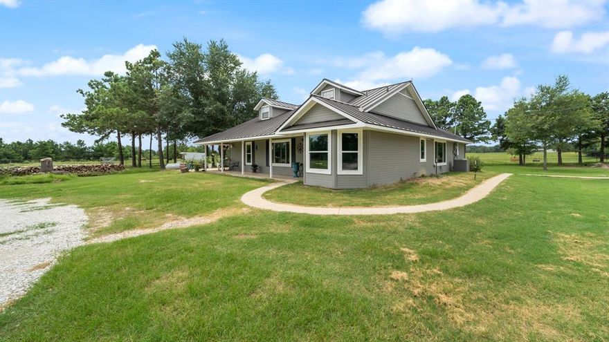 Embrace the beauty and tranquility of East Texas living on 15 secluded acres. Nestled on a private road, the 2,180 sq ft updated home features an open floor plan with spacious front porch and large covered back porch overlooking the sandy loam landscape with lush trees, pond and pastures. The luxurious kitchen has a new high end Samsung refrigerator and  Z-line gas stove with vent a hood.  All appliances will convey. The home also includes an incredible bonus room upstairs. The property is enhanced with a good-sized metal building, generator hook up, loafing shed with corral, 10 foot tall round pen, carport, piped fence, and electric gate entrance for added privacy and security. Located on a private road between the charming towns of Canton and Edgewood, this rural haven offers quick access to Highway 80 and Interstate 20, making it an ideal blend of seclusion and convenience. Enjoy the tranquility of rural living with the convenience of quick access to Highway 80 and Interstate 20. Don’t miss out on your dream retreat in East Texas!
THERE ARE ADDITIONAL 7+ ACRES THAT CAN BE SOLD WITH THE 15 ACRES AND HOME. CONTACT AGENT FOR DETAILS