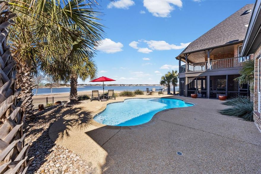 Set on 1.53 main-body waterfront acres with over 325 feet of shoreline on Waxahachie Lake, 110 Eagle Point delivers a rare opportunity to own a luxury lakefront retreat just 45 minutes from DFW International Airport and 30 minutes from Downtown Dallas. Located in Crystal Cove Estates, this premium waterfront property offers the ideal balance of privacy, proximity, and resort-style living—perfect as a full-time residence or weekend escape near DFW.

The 4,585-square-foot home features four bedrooms and four baths, including two owner’s suites on the main level, ideal for multi-generational living or hosting guests. Upstairs, two additional bedrooms share a second living area, media room, and snack bar, creating a private retreat for family and visitors. Walk-in attic storage and an oversized three-car garage provide everyday functionality.

Recent improvements—including a brand-new architectural roof with warranty, three high-efficiency HVAC systems, and updated water heaters—offer long-term peace of mind. Real wood doors throughout add warmth and craftsmanship.

Designed for indoor-outdoor living, the backyard anchors the property with a play pool (5.5-foot center depth), covered patio, fire pit area, and high-strength security-screened enclosure engineered to withstand high winds. The kitchen supports effortless entertaining with granite countertops, double ovens, generous storage, and seamless access to outdoor gathering spaces.

With ample room to build a private dock, enjoy direct access to the quieter waters of Waxahachie Lake, where holiday boat traffic is restricted to homeowners. Crystal Cove Estates amenities include a private boat ramp, pier, park, and putting green.

Luxury lake living with main-body frontage—minutes from downtown Waxahachie and within easy reach of Dallas-Fort Worth.