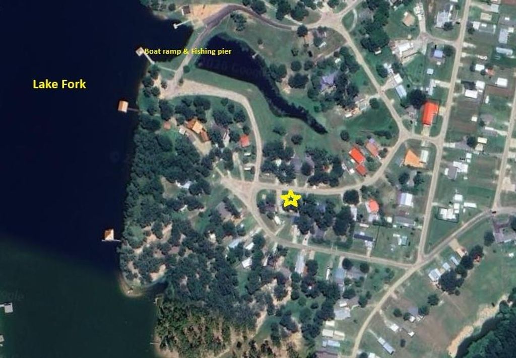 Photo of 718 Indian Gap, Quitman, TX 75783 (MLS # 21215437)