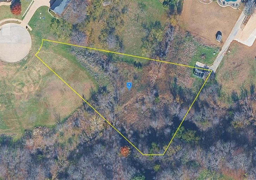 Seize a standout opportunity with this 0.94-acre vacant lot in Dallas, TX, offering an exceptional opportunity to build a custom home in a desirable, amenity-rich community. This spacious homesite features power on site with access to public water and sewer, making it well suited for immediate development. Located on a quiet cul-de-sac, the property offers added privacy and backs up to the neighboring Tangle Ridge Golf Club, providing scenic views and a peaceful setting. Community features include a hiking and jogging trails, sidewalks, and more, enhancing the lifestyle appeal. Convenient access to US-67, I-20, and major roadways allows for easy commuting to Dallas, employment centers, shopping, dining, and entertainment. Nearby attractions include Tangle Ridge Golf Club, Cedar Hill State Park, Joe Pool Lake, and local nature preserves, offering abundant outdoor recreation. Listing is for land only and is being sold As-Is.