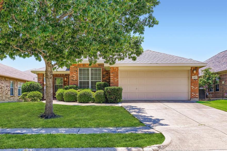 Beautiful 3-bedroom home nestled in the desirable Woodcreek subdivision! The open-concept layout features a large kitchen overlooking the living room, creating a perfect space for gatherings. The primary suite includes a spacious bathroom with a separate tub and shower. Enjoy the beautifully maintained backyard with a covered patio, perfect for outdoor relaxation. Residents of Woodcreek enjoy access to parks, playgrounds, jogging trails, and regular community events. A fantastic opportunity in a great neighborhood!