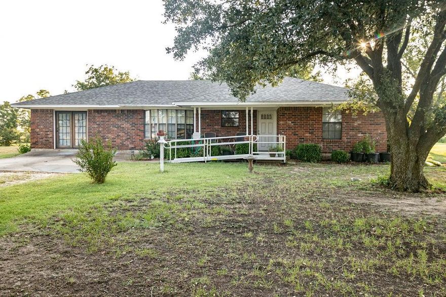 Equestrian-Friendly Country Oasis – 80+ Acres with Home, Barn, Ponds & Gardens Near 
Historic Hubbard, TX 
Discover the perfect blend of country charm and equestrian potential on over 80 acres, partially 
wooded for privacy and recreation. This 2,308 sq. ft. home, built in 1988, offers 3 bedrooms, 2 
baths, a galley kitchen with all-electric appliances and natural wood cabinets, a brick fireplace in 
the living room, and a large bonus room with abundant outlets. A screened-in sun porch provides 
year-round enjoyment, and a new heavy-duty 30-year shingle roof was installed in May 2025. 
A long private circular driveway leads directly to the home and shop. The detached barn-shop 
includes water inside and out, 220V outlets upstairs and downstairs, and large barn doors for 
easy access. A lean-to shed attached to the barn provides excellent covered storage for a boat, 
tractor, or equipment. An attached greenhouse, raised garden beds in the backyard, several fruit 
trees, and mature pecan trees create a true farm-to-table lifestyle. 
Fertilized pastures produced over 100 round bales of coastal bermuda hay in August 2025. Three 
stocked ponds with bass, perch, and catfish provide excellent fishing and attract dove and duck 
for hunting. Expansive flat areas are ideal for building a riding arena or corral—making this 
property a dream for horse lovers. Here, you can wake up to breathtaking sunrises, end your day with stunning sunsets, and enjoy 
dark, star-filled skies at night. Conveniently located between the I-45 and I-35 corridors, with 
easy access to Waco, Corsicana, Dallas, Fort Worth, Austin, and Houston.