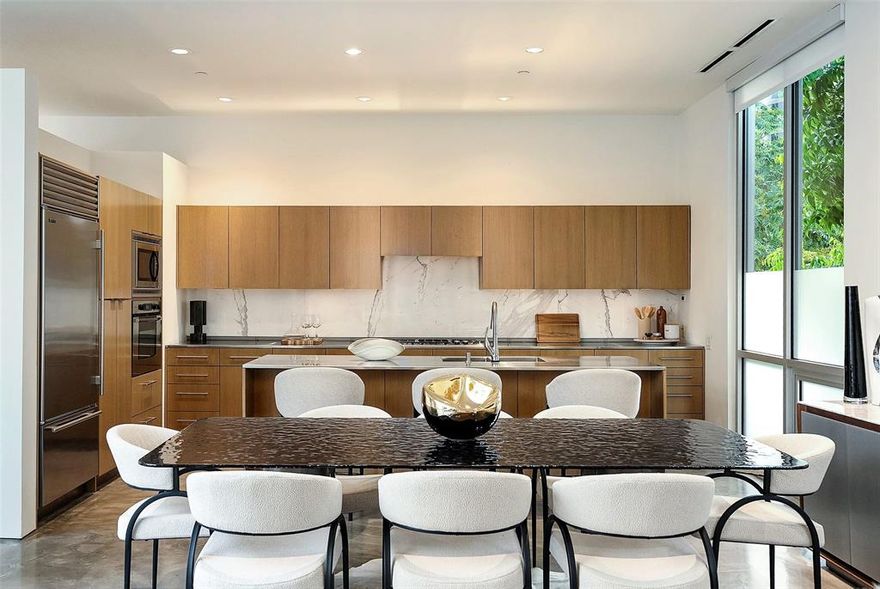 Welcome to Art House Unit 3B, a boutique architectural landmark in the heart of Oak Lawn, where contemporary design, privacy, and city-center convenience converge. With just eight residences, Art House offers a rare combination of exclusivity, elegance, and sculptural living — a sanctuary for those who value both form and lifestyle.

Unit 3B, designed by acclaimed architect Lionel Morrison, is a top-floor, treetop retreat centered around a private open-air courtyard. Floor-to-ceiling windows, expansive skylights, and soaring museum-finish walls frame a light-filled, gallery-like interior, while a private courtyard with a tranquil fountain creates a serene indoor-outdoor connection.

The sculptural kitchen is as functional as it is elegant, with stainless steel countertops, an oversized breakfast island, and premium Sub-Zero appliances, ideal for hosting intimate gatherings or celebratory dinners.

This residence features two refined bedroom suites, two-and-a-half baths, a glass-enclosed office, polished concrete floors, a dedicated utility room, two garage spaces, and private storage — all curated for elevated modern living. 

Experience the rare opportunity to own a museum-quality, treetop residence in one of Dallas’ most architecturally significant boutique communities, where light, design, and lifestyle unite in perfect harmony.