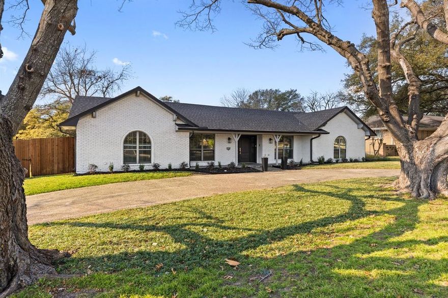 Nestled in the desirable Prestonwood neighborhood, this fully remodeled 4-bedroom, 3.5-bath home blends modern luxury with everyday comfort. Situated on a spacious 0.28-acre corner lot, the stately governor’s driveway enhances curb appeal while offering ample parking. The expansive 2,673 sq ft open-concept layout features vaulted ceilings, brand-new wood flooring, designer lighting, and fresh interior and exterior paint throughout. The chef’s kitchen showcases quartz countertops, a custom island with drop-down vent hood, and all-new appliances. The main living area is warm and inviting with built-in shelving and an electric fireplace. Bathrooms have been completely updated with custom vanities, quartz surfaces, and sleek vessel sinks. Significant recent upgrades completed within the last 6 months include a new roof, new AC system, new flooring, and new appliances, providing peace of mind and long-term value. The private backyard offers an ideal setting for entertaining or relaxing outdoors. An attached 2-car garage with alley access and additional carport parking add convenience. Located in award-winning Richardson ISD and minutes from major tollways, shopping, and dining. Price history reflects the property being temporarily removed from the market to complete extensive renovations and upgrades and is now reintroduced at an improved value. With its modern updates, spacious layout, and prime North Dallas location, this home presents an exceptional opportunity for both homeowners and investors.