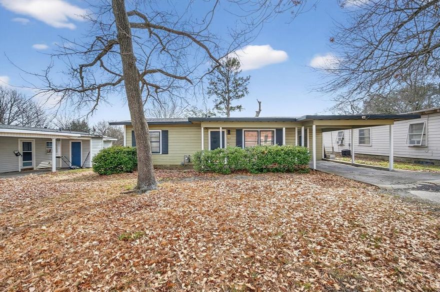 Charming & Move-In Ready Home with Carport + Bonus Storage!
Welcome to this well-maintained and inviting home offering classic character with thoughtful updates throughout. From the moment you arrive, you’ll appreciate the covered carport, mature trees, and welcoming front entry. Inside, you’ll find beautiful hardwood floors in the main living areas, creating warmth and charm. The spacious living room flows seamlessly into the dining area and kitchen, making it perfect for everyday living or entertaining guests.The kitchen features ample cabinet space, updated flooring, and plenty of natural light. With its functional layout and generous storage, it’s ready for your personal touch.The home offers comfortable bedrooms, large windows, and great natural light. The bathroom maintains its classic style with tile details and a practical layout. Step outside to enjoy the backyard space — ideal for relaxing, gardening, or hosting gatherings. The property also includes additional covered space and storage options for added convenience.Whether you’re a first-time buyer, downsizing, or looking for an investment opportunity, this home offers comfort, functionality, and value. Conveniently located near local amenities, schools, and major roadways.