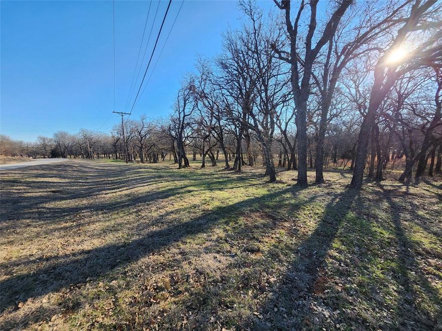 Beautiful acreage in North Texas Hill Country. Property is a total of 8 lots.  It backs up to Barefoot Creek and has beautiful mature oak and pecan trees throughout. An additional 13 lots of acreage can be sold with this property bringing it up to 7 Acres, please contact listing agent for details. lots are surrounded by the tranquility of nature as you will often see deer all around the property. Nocona Hills offers a 24-hour guarded gated community with access to two private lakes (one listed as top 5 Bass fishing in Texas)a community boat ramp and dock, as well as an 18-hole golf course with driving range, an airstrip, campgrounds with RV sites, and more. Utilities include co-op water and electric already at street. Fiber optic high speed internet is also available. Nearby surroundings include historic downtown Nocona, a winery, brewery and just a short drive to Saint Jo, Muenster and popular Casinos. Owner has multiple other lots available to choose from.  The Club house is under remodel along with the pool such an exciting new Update for the community.