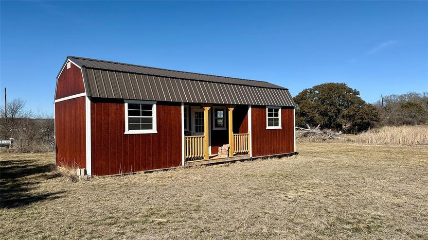 Bring your vision and turn this charming property into the perfect getaway. The cozy 360-square-foot building offers a blank canvas, ideal for a cabin retreat or weekend escape. Set on just over half an acre, the property provides plenty of room to expand and explore. It’s partially fenced with T-posts already in place, making it easy to complete. A small pond adds to the fun, offering the chance for peaceful moments or even an exciting fishing adventure right in your own backyard.