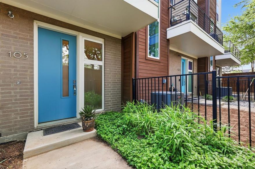 Welcome to modern urban living in the heart of East Dallas. This stunning contemporary condo at 4620 Munger Ave #105 offers the perfect blend of style, comfort, and convenience. Built in 2017, this beautifully designed 2-bedroom, 2.5-bathroom townhome-style condo features an open-concept layout with soaring ceilings and abundant natural light throughout. With 1,590 square feet, the home delivers spacious living paired with clean, modern finishes and thoughtful design. The main living area flows seamlessly into a sleek entertainer’s kitchen, creating an ideal space for hosting or everyday living. Enhancing both comfort and value, the home includes a whole-home water filtration system providing high-quality water throughout, along with custom window treatments that add style, privacy, and functionality. A private balcony off the kitchen and living room provides the perfect spot for relaxing or enjoying fresh air. Upstairs, both bedrooms feature private en-suite bathrooms, offering flexibility for guests, roommates, or a dedicated home office setup. Additional highlights include a 2-car attached garage for added convenience and storage. Located within a gated community, residents enjoy added privacy, guest parking, and shared outdoor spaces.