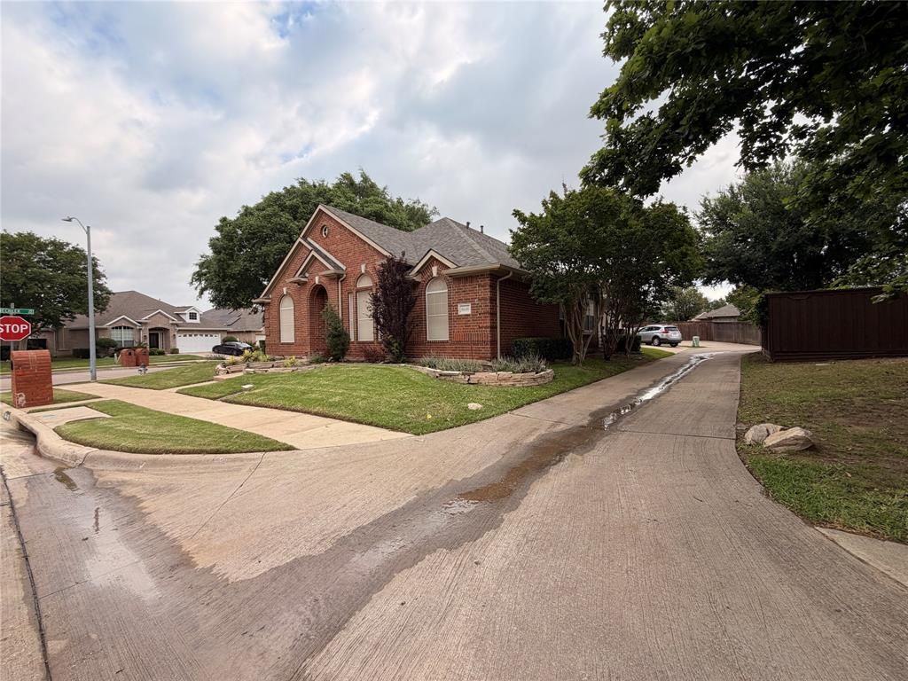 Photo of 8640 Woodcreek Drive, Irving, TX 75063 (MLS # 21252106)