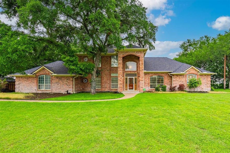 Discover your dream home with breathtaking views of a serene private lake. This exceptional property boasts 3 spacious bedrooms and 3.5 beautiful bathrooms, making it perfect for families or those seeking a tranquil retreat. Step inside and be captivated by 4 versatile living areas, ideal for entertaining guests or enjoying quiet evenings at home. The generous and well-appointed kitchen is a chef's delight, featuring modern appliances, ample counter space, and plenty of storage for all your culinary needs. The formal dining room is located just off the kitchen and boasts room for many guests. Descend the back yard walkway to the private lake access with stunning views from virtually every angle from the back of the home. Expansive Living Space: Four distinct living areas offer flexibility for relaxation, play, or work-from-home setups; formal living room, large family room, downstairs office, and upstairs library with a deck to enjoy nature. A spacious downstairs primary bedroom with an ensuite bathroom provides a perfect retreat after a long day. New hardwood floors in dining, family, study, and library create a warm environment. Newer carpet upstairs in the bedrooms. Spend countless hours on the backyard patio and cooling off in the sparkling inground pool. New roof April 2026, 1 new HVAC April 2026. Ideal Location: Nestled in a peaceful neighborhood, this home is still conveniently located near the Aledo ISD schools, shopping, dining, and recreational activities. Don’t miss out on this rare opportunity to own a stunning home with lake views! Schedule a viewing today and experience the magic of private lake living for yourself.