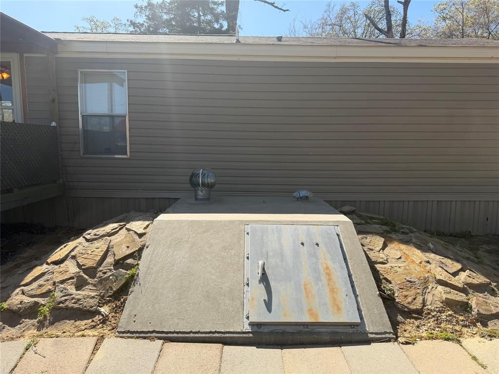 Photo of 985 Indian, Quitman, TX 75783 (MLS # 21187470)