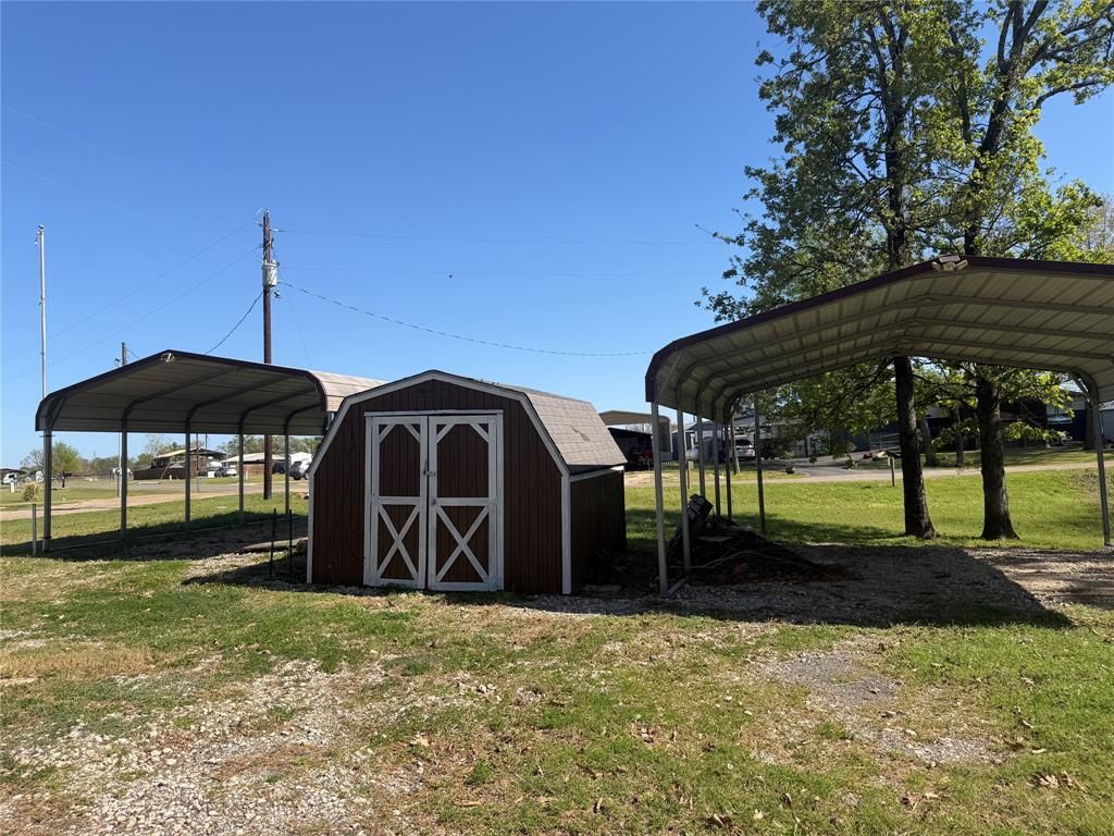 Photo of 985 Indian, Quitman, TX 75783 (MLS # 21187470)