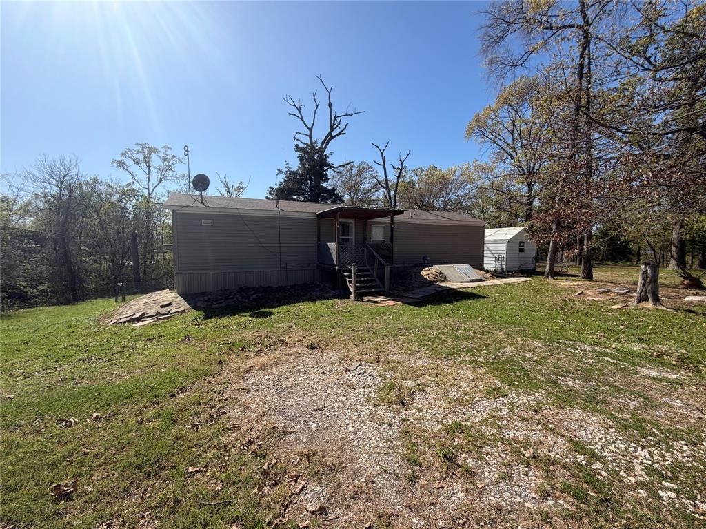 Photo of 985 Indian, Quitman, TX 75783 (MLS # 21187470)