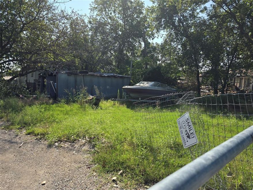 1 acre lot by the lake. Home on lot has no value. Just right for a new build and or even a mobile home.