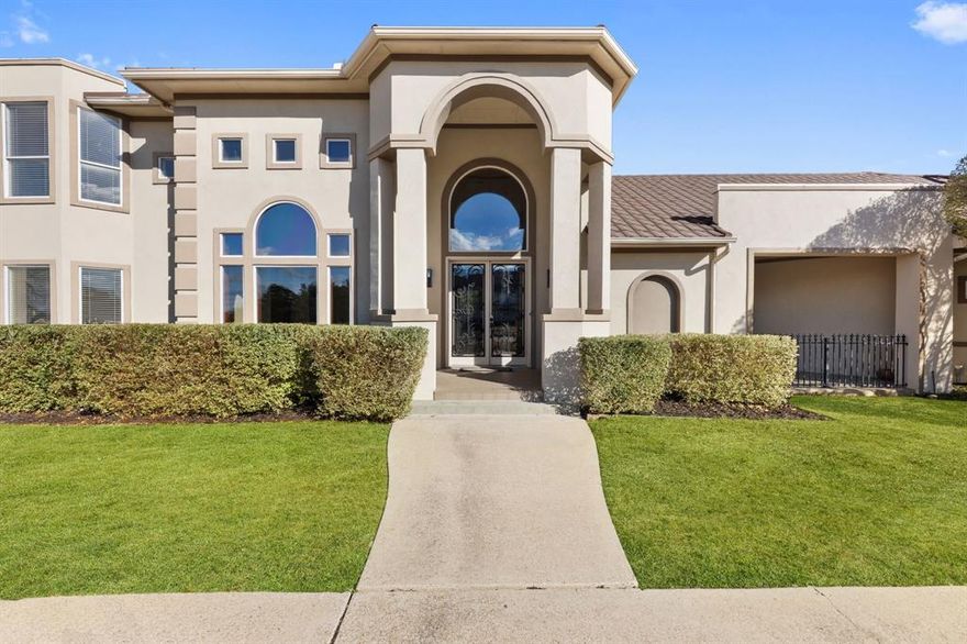 Nestled within an exclusive gated enclave of just 23 homes, this custom-built estate offers a rare blend of privacy, elegance, and versatility on nearly an acre. A circular driveway leads to a grand foyer highlighted by a sweeping staircase, creating an unforgettable first impression. The refined kitchen features an island, double ovens, and countertop seating for casual dining, flowing seamlessly into a cozy sunken living room with a fireplace. The first-floor primary suite is a true retreat with dual vanities, separate his-and-her closets, and private access to the backyard oasis. A main-level guest suite with direct outdoor access and its own covered porch is ideal for guests or multi-generational living.

The beautifully landscaped grounds showcase a resort-style swimming pool and gazebo, while a second-floor balcony overlooks the serene setting. Upstairs, a flexible office or media room adds functionality. A three-car garage and a detached multi-use structure—perfect for a fitness studio, guest quarters, or creative space—complete the property. Residents also enjoy a tranquil duck pond with dual water fountains, all within a secure and intimate community that offers rare distinction, just minutes from everything Dallas has to offer.