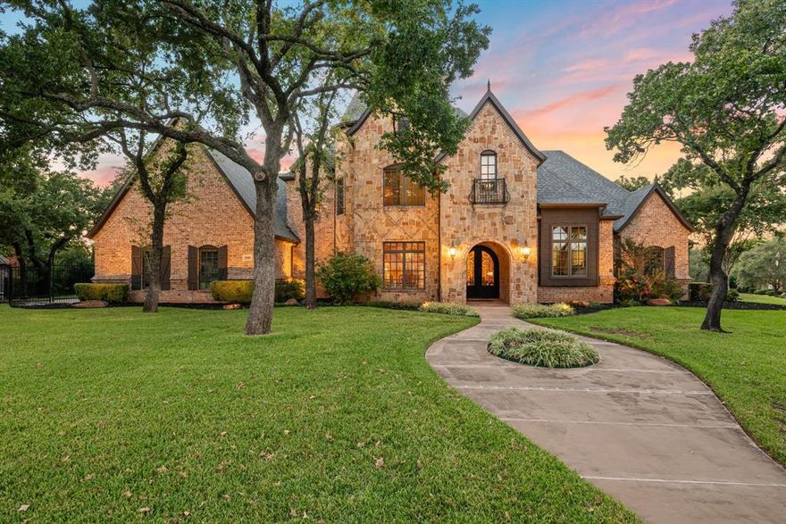 Multiple Offers: Offer Deadline is Monday, March 16 at 5:00 pm
Set on more than an acre in one of Southlake’s most admired neighborhoods, 3008 Broadgate Lane offers presence and seclusion while remaining moments from everything that makes our city special. Towering trees frame the approach, creating a sense of arrival and privacy that has become increasingly rare in Southlake.
Inside, the home opens to a dramatic entry with soaring ceilings, a sweeping staircase, and natural light pouring through tall windows into the main living spaces. Beautiful architectural details, warm wood beams, and stone accents carry throughout the home, continuing seamlessly into the kitchen and family room. The living spaces flow effortlessly, blending warmth and craftsmanship with generous proportions designed for both grand entertaining and comfortable daily living.
The kitchen and family room become the heart of the home, where rich wood cabinetry, striking beams, and a substantial island create a space that feels both sophisticated and welcoming. It is a setting where gatherings naturally linger, whether hosting friends for an evening or enjoying quiet mornings at home.
Just beyond the main living areas, a distinguished private office offers a refined space to work or study. Wrapped in beautiful woodwork and filled with natural light, it feels timeless and substantial, perfectly suited for those who appreciate classic design. Upstairs, both a game room and a media room provide additional space for relaxing evenings, movie nights, and time spent together.
Outdoors, the backyard becomes its own private retreat. A covered patio with an outdoor kitchen overlooks the pool and spa, while mature trees surround the grounds and frame the setting in shade and privacy. Evenings here unfold easily, whether spent entertaining guests, relaxing by the fire, or simply enjoying the quiet of the setting.