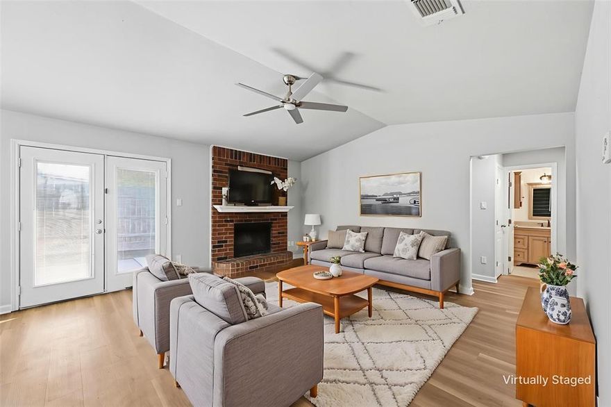 Discover a harmonious blend of comfort and style in this captivating 3-bedroom, 2 bath, newly updated home. New features include; LVP flooring and carpet, fresh paint throughout, countertops, farm sink and dishwasher, light fixtures and more. As you step inside, a sense of openness greets you in the inviting living room. The vaulted ceilings enhance the airiness, drawing in the natural light. The kitchen seamlessly integrates with the living space allowing easy conversation. The oversized primary suite offers a private retreat on the upper level, complete with ensuite bathroom and walk in closet. Step outside and go for a walk on the newly paved sidewalks throughout the neighborhood or make the backyard your own oasis. This residence is just a mile from Starbucks and a few minutes to the main Highways!