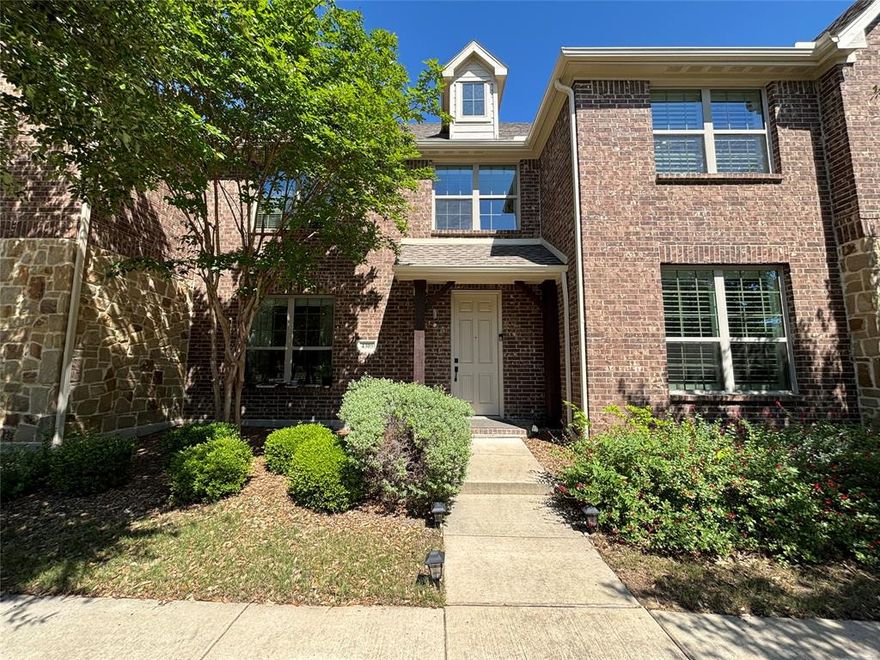 This stylish and well-designed townhome is all yours! Just steps from the community pond, pool, and dog park, it offers both comfort and convenience. Enjoy a short walk to shopping, restaurants, and scenic walking trails. Perfectly located near highways 121 and 75, commuting is a breeze.

Inside, the open floor plan is ideal for entertaining, featuring soaring ceilings, beautiful hardwood floors in the living area, and a true two-car garage. The spacious primary suite boasts a must-see walk-in closet.

Come fall in love with your new home today!