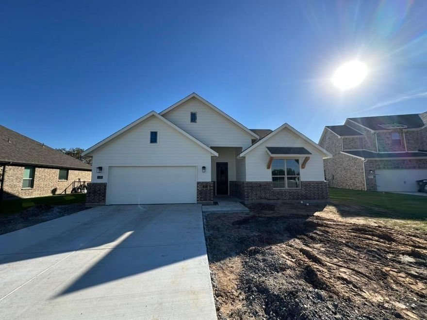 Estimated January 2025 completion! Ask us about our Trade In Trade Up program, we can buy your home! The Bailey is sized to fit so many lifestyles—first-time homebuyer, the growing family, and anyone just looking for enough room to be comfortable. The 2,055-square-foot, single-level home design presents so many opportunities to create the home you want. Start with the exterior and choose from 3 elevations: Modern Farmhouse, Craftsman, or European. Step inside to a home that welcomes you with an open floor plan and 3 generously-sized bedrooms. The kitchen serves up ample prep space that includes a large center island. The pantry is like a room on its own, so you can stash everything you need for your culinary activity. The owner suite in the Bailey is an awe-inspiring space. Combine a huge bedroom that affords a sitting space with a walk-in closet dressing room, and a owner's bath that gives both a soaking tub and step-in shower. The other 2 bedrooms share the second full bath in the home, with the laundry room separating those living spaces from your suite—whether or not you all equally share the laundry chore! Riverside Homebuilders includes many finishes in the Bailey, like a hall bench in the mudroom, granite countertops, and crown molding. If you’re looking for something around 2,000 square feet, live large in this home.
SPRAY FOAM ENCAPSULATED! NO HOA! Beautiful open concept kitchen living area, large utility room, Kitchen Island, wood look luxury vinyl plank flooring, shower & separate tub in primary suite, Shaker style painted Pewter Cast cabinets, and much more!