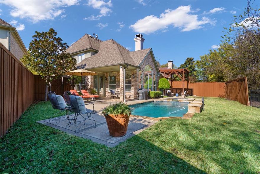 Private gated living in Far North Dallas—backing to a creek and greenbelt with a saltwater pool.

Located inside the intimate 7-home community of Coventry on the Creek, this custom Shelley Malone home offers rare privacy, natural views, and flexible living space under $1M. With 4 bedrooms, 3.5 baths, a dedicated study, game room, and true media room, the layout is designed for both everyday comfort and entertaining.

Natural light fills the home, highlighting soaring ceilings, real hardwood floors, and expansive windows overlooking the pool and trees. The open-concept kitchen features gas cooking, custom drawer organizers, pull-out storage, a dedicated spice drawer, and generous prep space—flowing seamlessly into the main living area.

The primary suite is privately located on the main level with French doors opening to a secluded patio retreat. Upstairs, three additional bedrooms—including one currently used as a fitness room—are complemented by a spacious game room and media room.

The backyard is a standout: expanded patio, sparkling saltwater pool, and peaceful greenbelt views with HOA-maintained space beyond the fence for added privacy.

Recently refreshed with new interior paint and move-in ready. Convenient access to shopping, dining, major corridors, and Plano ISD, along with several highly regarded private schools.

A rare opportunity to own a gated custom home with pool and greenbelt views in 75252.  The community also features convenient pedestrian access, making it easy to enjoy walks in and out of the neighborhood.