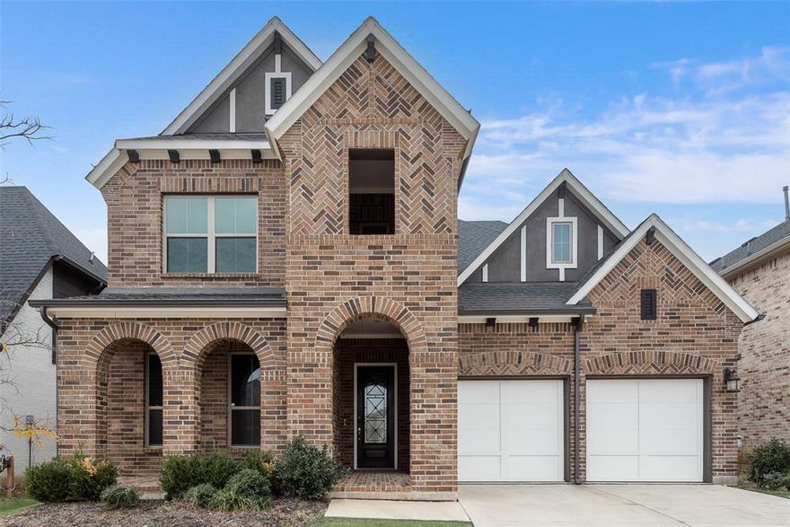 Executive living meets thoughtful design in this spacious 4-bedroom home located in the heart of Northlake and zoned to highly acclaimed Argyle ISD. The main level offers exceptional functionality with a private primary suite and a secondary bedroom on the first floor—ideal for guests or multigenerational living—along with a dedicated home office.
The open-concept living room centers around a fireplace and flows seamlessly into the eat-in kitchen, while a formal dining space provides flexibility for entertaining or everyday use. The oversized primary retreat features a spa-inspired en-suite with soaking tub, separate shower, double vanities, and a large walk-in closet.
Upstairs, you’ll find two additional bedrooms, two full bathrooms, a generous game room, and a massive media room that can easily serve as a flex space for a second office, home gym, or even an additional bedroom if needed.
Enjoy outdoor living on the covered back patio and take full advantage of the community’s outstanding HOA amenities, including a pool, walking trails, and more. This well-appointed executive home offers space, versatility, and a location that checks every box.