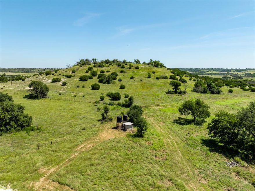 519.23± Acres — Prime Hunting & Cattle Ranch Near Evant, Texas
Exceptional Farm & Ranch property just west of Evant in Hamilton County, offering the rare combination of great hunting, strong cattle infrastructure, and a highly desirable Central Texas location. The ranch features over 100 feet of elevation change, providing outstanding views, rolling terrain, and excellent wildlife habitat with scattered tree cover.
This property is well known for excellent hunting, with ideal cover and terrain for whitetail deer, turkey, and native game. Approximately 100 acres of quality farmland add food-source potential, while the remaining acreage is native pasture—perfect for grazing and wildlife management. Ranch improvements include a good set of pipe working pens, water piped to all pastures, one water well, and three stock tanks, ensuring dependable water for both livestock and game. A rock hunters’ cabin makes a great weekend retreat or hunting headquarters.
Families will appreciate being located in the Evant School District, and peace of mind comes with convenient access to Hamilton Hospital, approximately 30 minutes away. The ranch is centrally located, just 30 minutes from Hamilton, Goldthwaite, Gatesville, and Lampasas, about 1 hour from Brownwood, Stephenville, and Killeen, and roughly 1.5 hours from Waco and Temple.
If you’re searching for a large-acreage ranch near Evant that offers top-tier hunting, solid cattle operations, good water, elevation, and nearby schools and medical care, this Central Texas property deserves a close look.