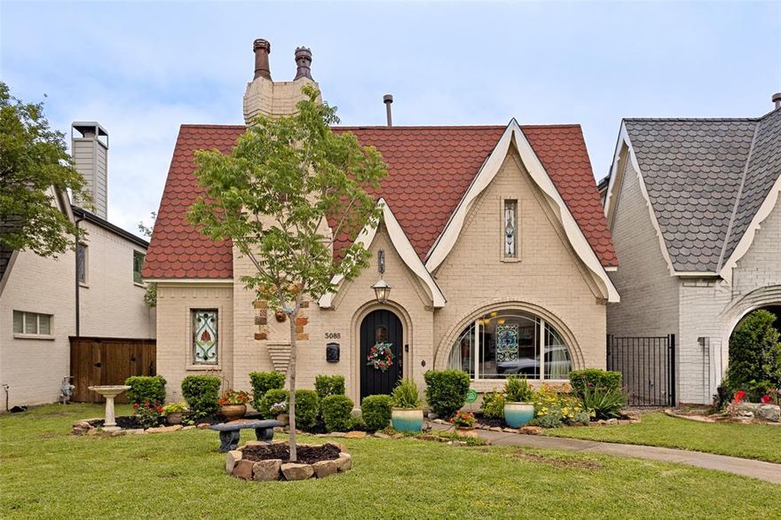 Nestled in the heart of historic McKinney, 508B N Tennessee is a storybook Tudor brick home that captures timeless charm with its striking red roof and enchanting architectural details. From the moment you arrive, you’ll be drawn in by its character, warmth, and inviting presence. Inside, the home offers a thoughtfully designed open floor plan, perfect for both everyday living and entertaining. The spacious family room with beautiful hardwood floors, centers  around a cozy fireplace, creating an ideal gathering space, while seamlessly flowing into the dining area and light-filled kitchen. The kitchen features a gas range, beautiful granite countertops, and ample cabinetry, making it as functional as it is stylish. An office on the first floor provides the perfect space for working from home or a quiet retreat. Throughout the home, stained glass accents add a touch of artistry and historic charm, creating a unique and memorable ambiance. Upstairs, the primary ensuite is a true sanctuary, complete with a sitting area, dual sinks, and a generously sized closet. Two additional bedrooms offer comfort and flexibility for family or guests. Step outside to your own private courtyard, shaded by mature trees~an idyllic setting for morning coffee or unwinding in the evening with a glass of sweet tea. The two-car garage adds convenience, while the location is simply unmatched. New roof and new water heater-2025. Just a short stroll down Tennessee Street brings you to the vibrant McKinney Square, where dining, shopping, and community events await. 508B N Tennessee is more than a home~it’s a lifestyle, offering charm, comfort, and connection in one of McKinney’s most beloved historic neighborhoods.