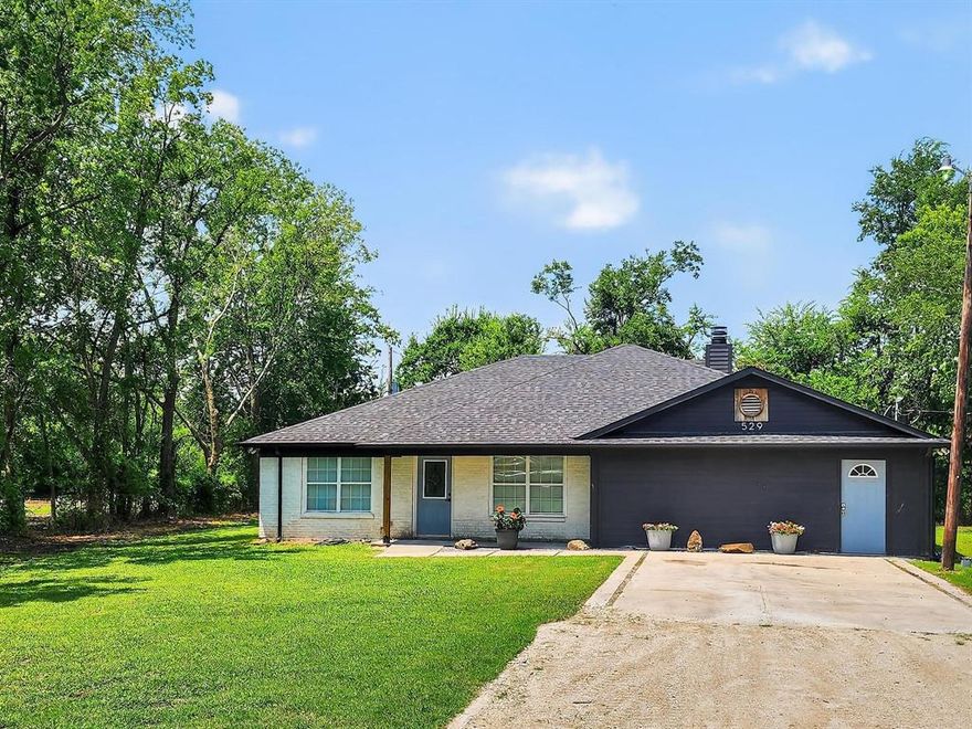 Experience country living with city convenience! Situated on a quiet wooded half-acre lot, this updated 4 bedroom, 2 bath home is just minutes from downtown Howe and 7 miles from Texas Instruments in Sherman. Inside, you’ll find an open-concept kitchen and living area with a fireplace, a spacious primary suite with a jacuzzi tub, and a converted garage bonus room with its own full bath—perfect for guests, a home office, or media room.

Outside, there’s plenty of room for your boat, trailer, or extra vehicles, along with a spacious backyard shaded by mature trees—ideal for relaxing, entertaining, or simply enjoying the peace and quiet of the countryside.

Recent updates include a new roof, new AC, and other ongoing renovations.