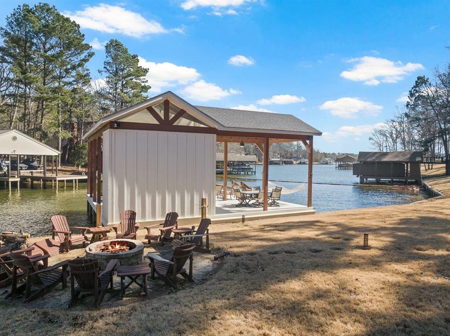 Tucked away on the sought-after shores of Lake Cypress Springs, this charming lake home offers the perfect blend of relaxed comfort and resort-style living. Located in the amenity-rich Kings Country neighborhood, owners enjoy access to a community boat ramp, clubhouse, tennis courts, and security—making lake days effortless and weekends feel like a getaway.

The home features a flexible floor plan designed for gathering, entertaining, and accommodating a crowd. While there is not a traditional primary suite, the layout comfortably sleeps multiple guests, making it ideal for family retreats, weekend getaways, or hosting friends at the lake. Vaulted ceilings, an open living area with fireplace, and warm finishes create a cozy, welcoming atmosphere throughout.

Step outside to enjoy waterfront views and a brand new boathouse —perfect for boating, swimming, or simply relaxing lakeside. Whether you’re looking for a full-time lake residence or a low-maintenance weekend escape, this property delivers the charm, location, and lifestyle Lake Cypress Springs is known for.