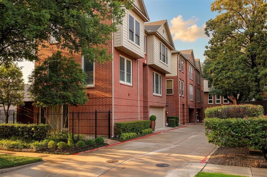 Rare opportunity to own a private, stand-alone townhome in Oak Lawn. Tucked away at the end of a quiet drive, this home lives like a low-maintenance single-family residence (with no HOA!) and offers a highly functional layout. The first floor features a guest bedroom, full bath, laundry area, and access to a private yard. The second-floor main living area showcases fresh paint, a re-tiled fireplace, and a custom high-gloss ceiling. The kitchen, equipped with a new Wolf 30” dual-fuel range, opens to a designated dining space and private deck overlooking a peaceful green space - an uncommon find in this vibrant location. The third floor offers a spacious primary suite with treetop views, and a large walk-in closet and updated primary bathroom. An additional large guest bedroom with ensuite is also located on the third level. Among many other fantastic features, highlights and recent updates include Class IV GAF shingles impact resistant roof with solar integration (2023), refinished and stained oak hardwoods (2023), new carpet on stairs (2026), garage floor sanded, sealed, and covered with “tidal wave” polyaspartic coating (2026), and Lutron lighting with automatic shades (blackout in the primary). Conveniently located near Highland Park Village, Katy Trail, Dallas North Toll Road, Downtown Dallas and more, this property offers a unique blend of privacy, modern updates, and unbeatable walkability in one of Dallas’ most desirable areas.